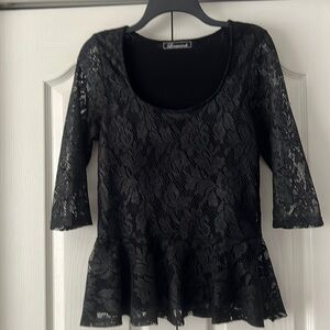 Black peplum top.